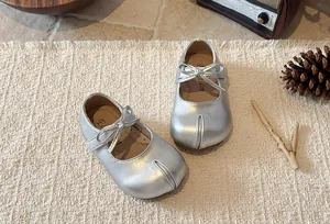 Elegant silver girl's bow Mary Jane princess shoes with a soft sole for spring comfort.