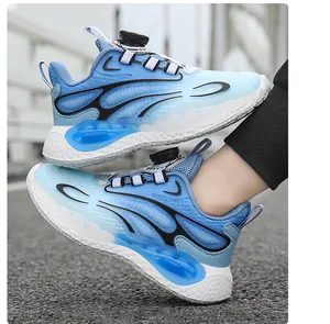 Close-up of blue flame-patterned boys' sneakers with convenient rotary buckle closure.