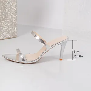 Side profile of silver pointed-toe stiletto sandals featuring an 8cm high heel measurement