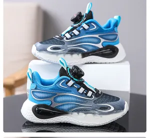Modern blue boys sports sneakers featuring a convenient and secure rotary buckle lacing system.