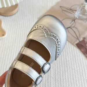 Silver girls Mary Jane princess shoes with elegant brogue carving and double straps
