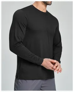 Detail shot of men's black Merino wool blend long-sleeved sports shirt showing fit