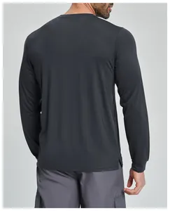 Back view of a men's dark grey long-sleeved athletic shirt in Lyocell Merino blend