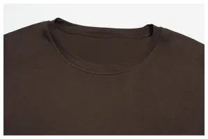Close-up of dark brown Lyocell Merino wool blend sports T-shirt round neck collar