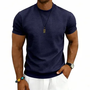Detail van marineblauwe wafelstructuur op het slim fit heren-T-shirt met ronde hals