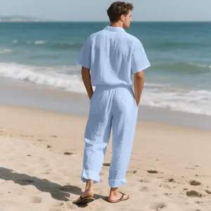 Rear view of comfortable men's light blue linen beach set featuring shirt and long pants