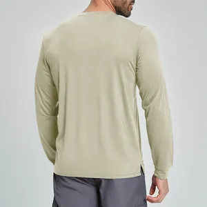 Back view of a khaki long-sleeved athletic shirt for men in Merino wool blend.