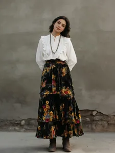 Elegant high-waisted floral tiered velvet maxi skirt with a vintage bohemian style