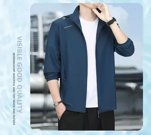 Close-up of men's blue UV protection jacket on model showing breathable fabric texture