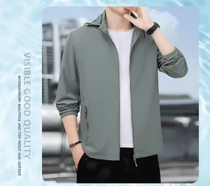 Men's lightweight grey ice silk sun protection jacket with hood shown on a male model