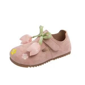 Pink suede girls princess shoes with flower embroidery and 3D tulip ribbon bow detail