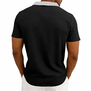 Back view of a men's black waffle knit polo shirt with contrast grey collar detail.