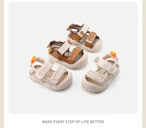 Detail view of infant summer sandals with soft non-slip soles in two neutral colors