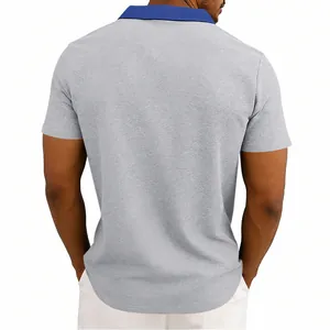 Detailed back view of men's waffle knit polo shirt featuring a contrast blue collar