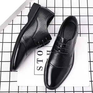 Scarpe classiche in pelle nera traforata e traspirante per l'abbigliamento formale maschile