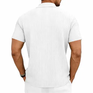 Back view detail of men's white knit jacquard polo shirt showing fabric texture