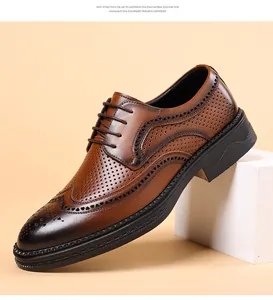 Detailed view of brown hollow brogue shoes with wingtip perforations and thick soles.