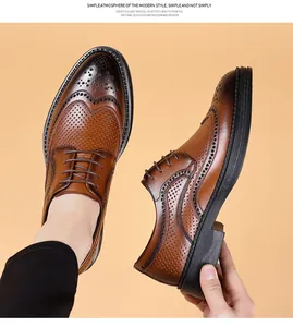 Close-up of brown Brogue leather shoes with elegant wingtip perforations and thick sole