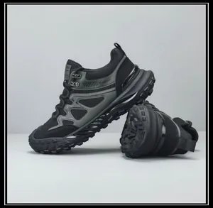 Close-up detail of durable black men's outdoor hiking shoes with breathable mesh and rugged soles