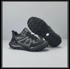 Black and grey men's outdoor hiking shoes with breathable mesh and rugged rubber soles