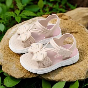 Adorables sandalias rosas para niñas con lazos decorativos y cómodas suelas suaves antideslizantes