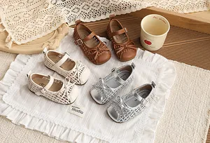 Sandalias tejidas para niña en tres colores con lazo y hebilla