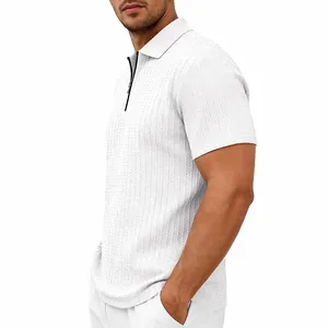Detail view of the white textured knit polo shirt with zipper collar.