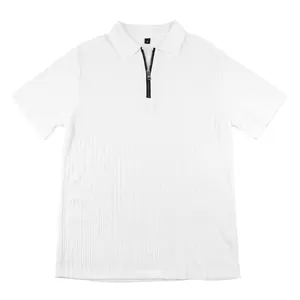 Macro detail of men's white knitted polo shirt with textured fabric and zipper