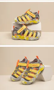 Detailed view of yellow and grey outdoor children's closed-toe wading sandals with strap