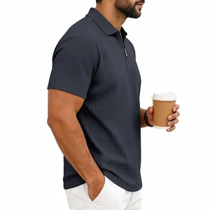 Side view of a men's navy blue short sleeve knit polo shirt featuring a textured zipper