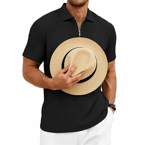 Detail shot of men's black knit texture polo shirt with a stylish zipper neckline.