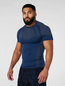 Front view of a men's navy blue athletic compression gym t-shirt on a fit model