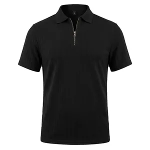 Detailed view of black men's knitted polo shirt with vertical texture and zipper