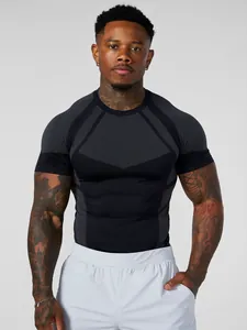 Close-up of men's athletic compression t-shirt featuring a honeycomb textured design.