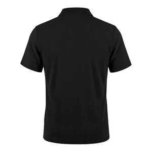 Back view of men's black textured knit polo shirt with vertical cable knit pattern details