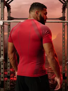Back view of men's red compression T-shirt showing muscle fit and ergonomic design