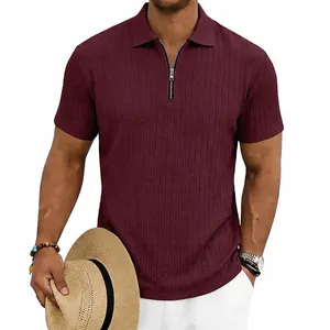 Detail of men's burgundy knitted texture polo shirt with stylish zipper collar