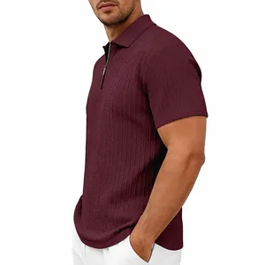 Detail view of maroon polo shirt showing textured cable-knit fabric and zip neckline