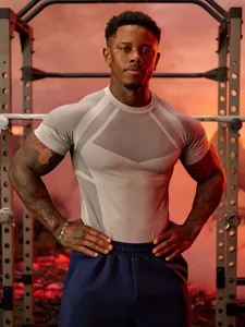 Men's athletic compression t-shirt with honeycomb mesh pattern for gym and training