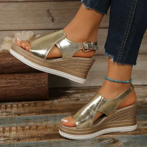 Stylish metallic gold wedge sandals for women with peep toe and buckle strap