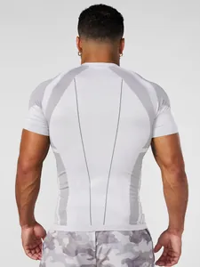 Back view of men's light grey short-sleeve compression shirt with athletic paneling details