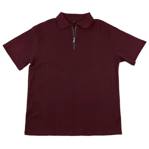 Detailed view of a burgundy men's casual knit polo shirt with cable texture and zipper.