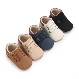 Five pairs of high-top baby walking shoes in different colors arranged diagonally.