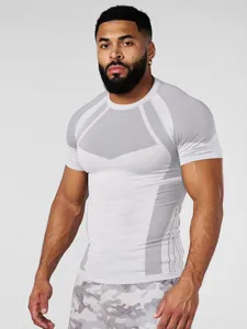 Close-up front view of white men's compression t-shirt with honeycomb mesh texture