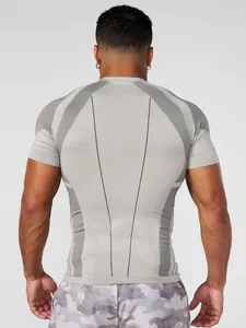 Detailed back view of men's grey compression t-shirt showing athletic fit and design