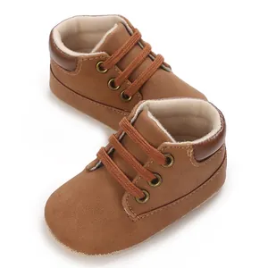 Detailed view of brown soft-sole baby boy sneakers suitable for infants aged 0 to 1 year