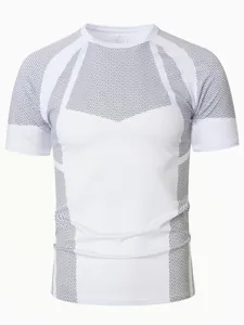 Detailed view of men's white compression T-shirt featuring grey honeycomb pattern design