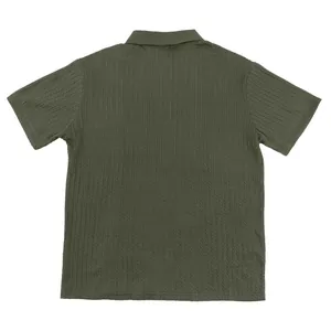 Back view detail of men's olive green cable-knit polo shirt with textured pattern.