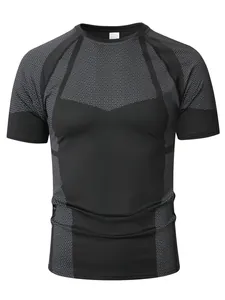 Detailed front view of a black men's athletic compression T-shirt with grey hex pattern