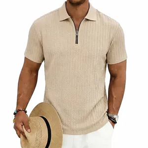 Close-up view of men's khaki knitted polo shirt with vertical texture and metal zipper